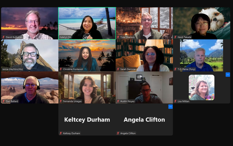 A group photo of smiling people taken as a screen shot from a recent Zoom meeting. 